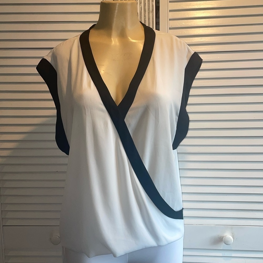 Vince Camuto asymmetrical, white blouse with black trim size M